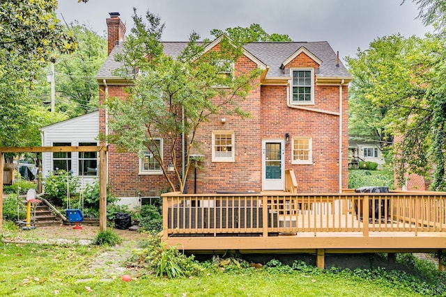 213 Kensington Ave, Lynchburg, VA 24503 - back of house featuring brick siding, a chimney, a wooden deck, and roof with shingles