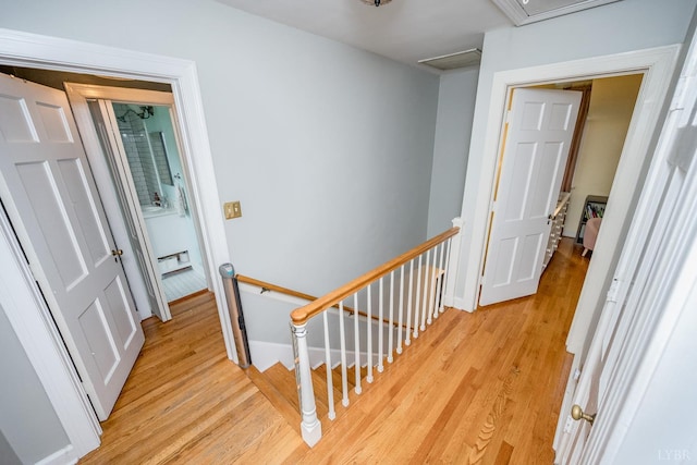 213 Kensington Ave, Lynchburg, VA 24503 - stairway with a baseboard radiator, wood finished floors, and baseboards