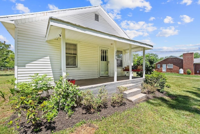 200 Jasper Wood Rd, Hurt, VA 24563 - view of front of house with a front yard and covered porch