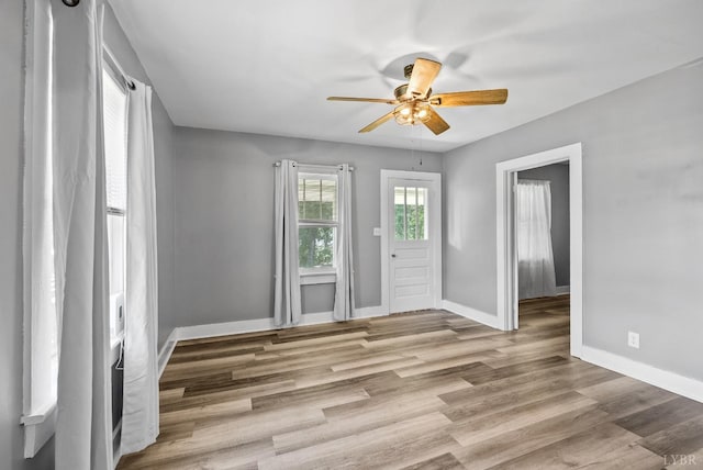 200 Jasper Wood Rd, Hurt, VA 24563 - entrance foyer with a ceiling fan, baseboards, and wood finished floors