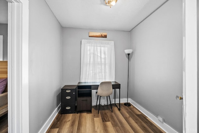 200 Jasper Wood Rd, Hurt, VA 24563 - home office featuring dark wood-type flooring and baseboards