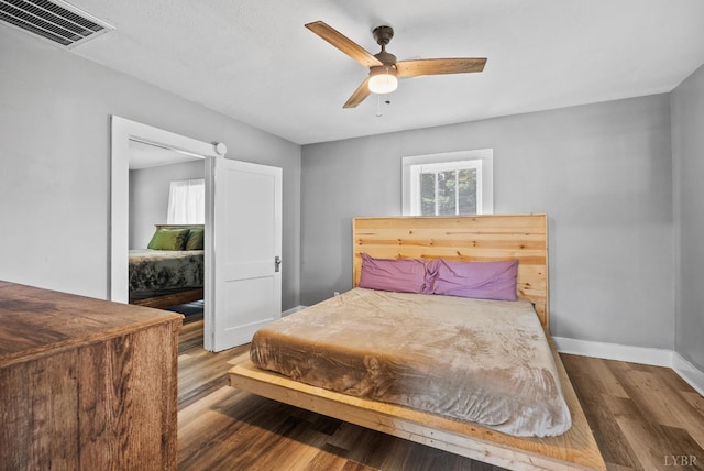 200 Jasper Wood Rd, Hurt, VA 24563 - bedroom featuring wood finished floors, baseboards, and ceiling fan