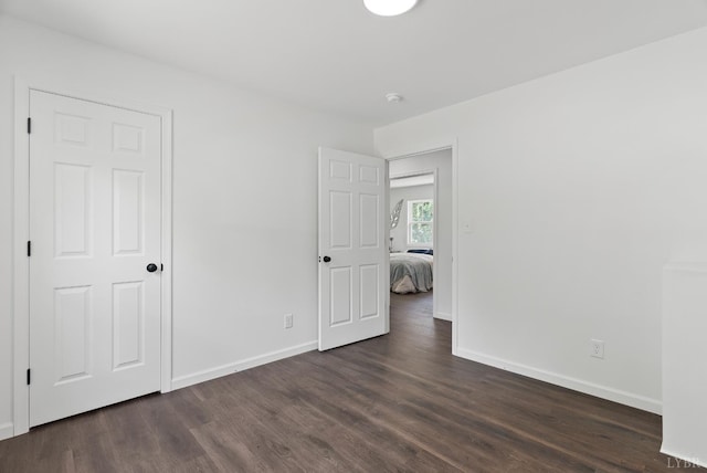 1040 Coronado Ln, Lynchburg, VA 24502 - unfurnished bedroom with dark wood finished floors and baseboards