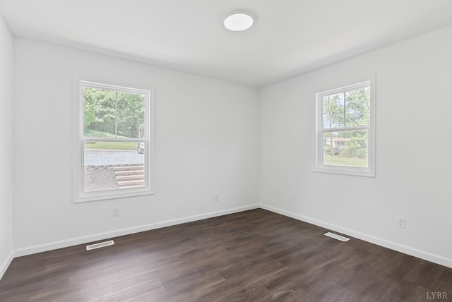 1040 Coronado Ln, Lynchburg, VA 24502 - spare room featuring healthy amount of natural light, dark wood finished floors, and baseboards