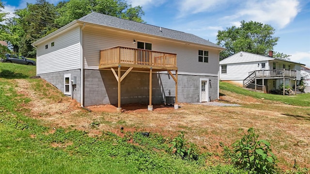 1040 Coronado Ln, Lynchburg, VA 24502 - rear view of property featuring a wooden deck, a yard, and cooling unit