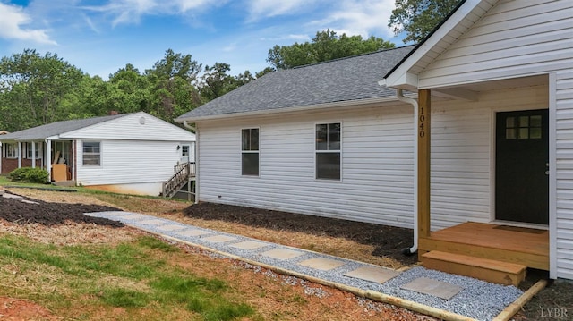 1040 Coronado Ln, Lynchburg, VA 24502 - view of side of home featuring roof with shingles