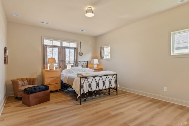 1268 Stoney Ridge Blvd, Forest, VA 24551 - bedroom featuring multiple windows, light wood finished floors, and baseboards