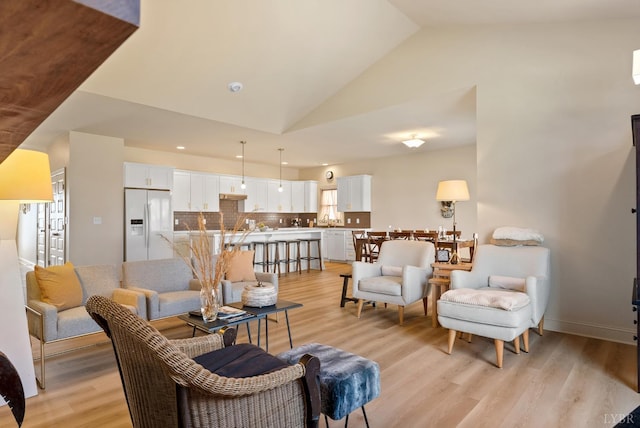 1268 Stoney Ridge Blvd, Forest, VA 24551 - living area featuring lofted ceiling, light wood-type flooring, baseboards, and recessed lighting