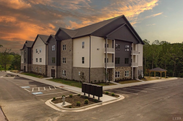 128 Brenleigh Ct Unit 105, Lynchburg, VA 24501 - view of building exterior with uncovered parking