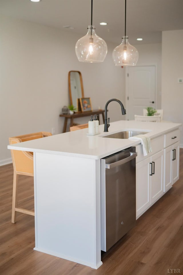 128 Brenleigh Ct Unit 105, Lynchburg, VA 24501 - kitchen with stainless steel dishwasher, a sink, a center island with sink, wood finished floors, and recessed lighting