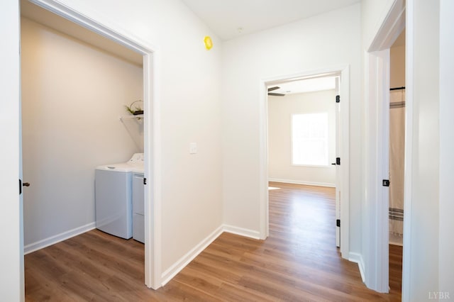 128 Brenleigh Ct Unit 105, Lynchburg, VA 24501 - laundry room featuring light wood-style floors, washing machine and clothes dryer, and baseboards