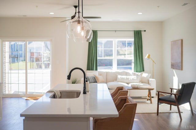 128 Brenleigh Ct Unit 105, Lynchburg, VA 24501 - living room featuring wood finished floors, a ceiling fan, and recessed lighting