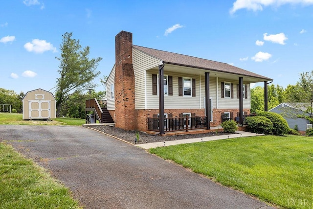 115 Mattiponi Dr, Madison Heights, VA 24572 - bi-level home with brick siding, a chimney, covered porch, and a front lawn