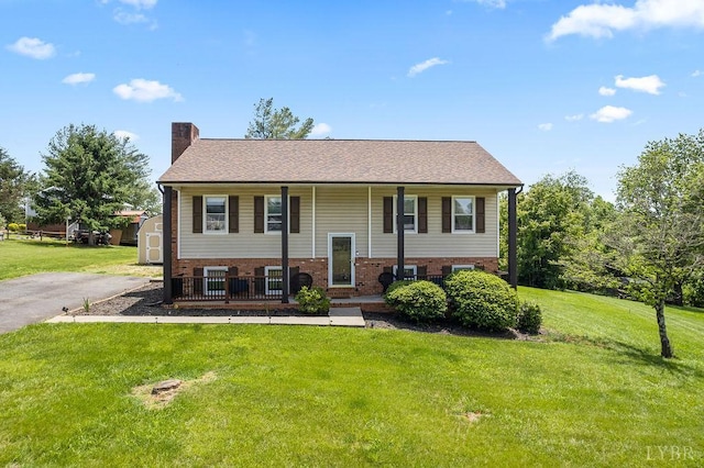 115 Mattiponi Dr, Madison Heights, VA 24572 - raised ranch with a chimney, a porch, a front lawn, and brick siding