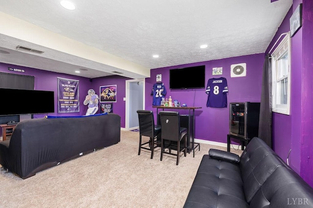 115 Mattiponi Dr, Madison Heights, VA 24572 - living area featuring carpet floors, recessed lighting, beverage cooler, baseboards, and a textured ceiling