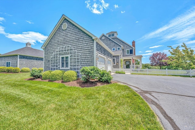 145 Golfers Crossing Dr, Penhook, VA 24137 - view of side of home with driveway and an attached garage
