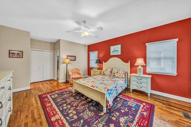 145 Golfers Crossing Dr, Penhook, VA 24137 - bedroom featuring baseboards, wood finished floors, a ceiling fan, and a closet