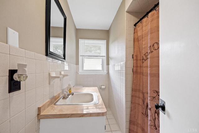 147 Maple Dr, Madison Heights, VA 24572 - bathroom featuring tile walls, vanity, and a wainscoted wall