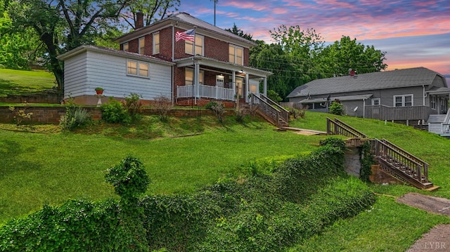 10662 Lee Jackson Hwy, Big Island, VA 24526 - view of front facade with stairway, a lawn, and a porch