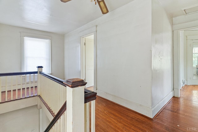 10662 Lee Jackson Hwy, Big Island, VA 24526 - hallway with an upstairs landing, wood finished floors, and baseboards