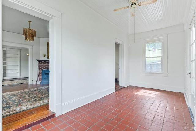 10662 Lee Jackson Hwy, Big Island, VA 24526 - spare room with a ceiling fan, baseboards, and a chandelier