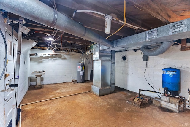 10662 Lee Jackson Hwy, Big Island, VA 24526 - unfinished basement featuring water heater, a water pressure tank, and heating unit