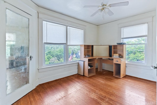 10662 Lee Jackson Hwy, Big Island, VA 24526 - unfurnished office with light wood finished floors, plenty of natural light, baseboards, and a ceiling fan