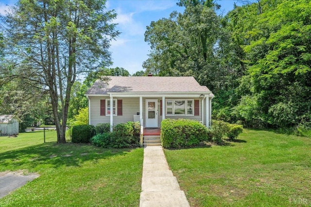 1104 Amherst Ave, Altavista, VA 24517 - bungalow with a front yard and a porch