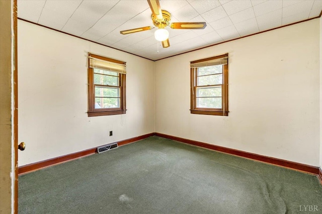 1104 Amherst Ave, Altavista, VA 24517 - spare room with carpet flooring, healthy amount of natural light, ceiling fan, and ornamental molding