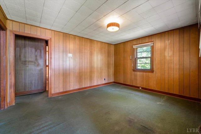 1104 Amherst Ave, Altavista, VA 24517 - carpeted empty room with wooden walls and baseboards