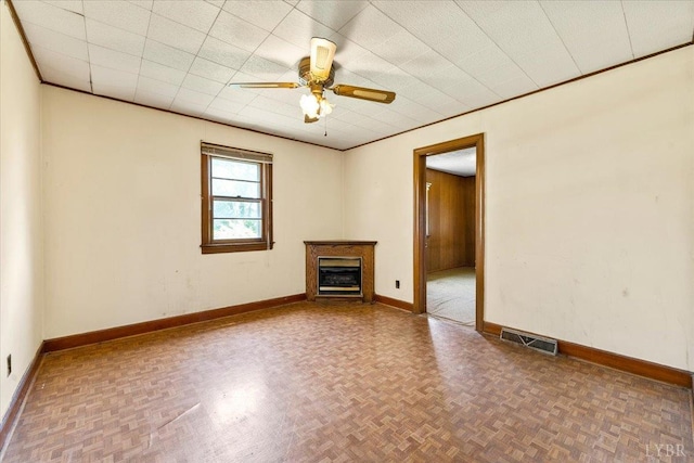 1104 Amherst Ave, Altavista, VA 24517 - unfurnished living room featuring baseboards, ceiling fan, and a glass covered fireplace