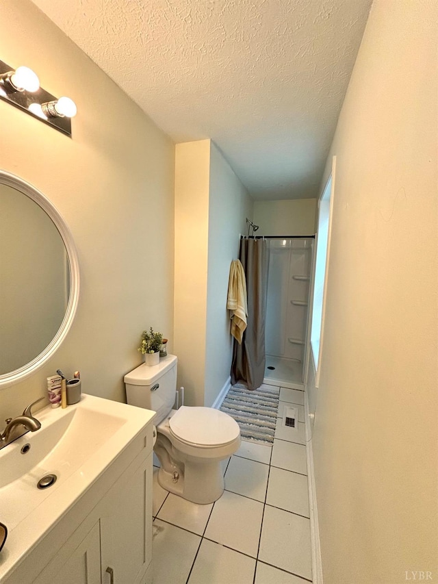 136 Jubilee Dr, Lynchburg, VA 24501 - bathroom featuring a shower with curtain, tile patterned flooring, vanity, and a textured ceiling