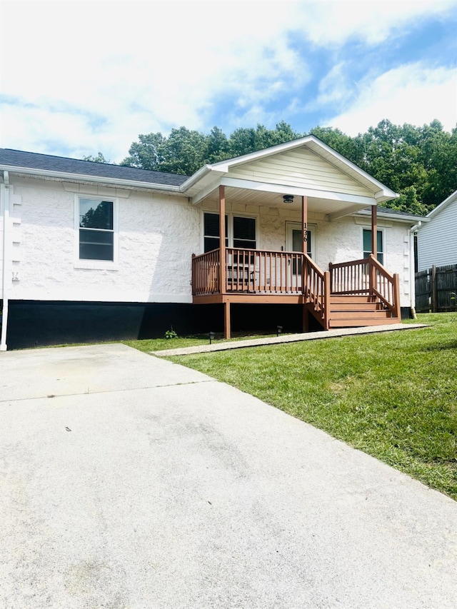 136 Jubilee Dr, Lynchburg, VA 24501 - view of front of home with covered porch, a front yard, and stucco siding