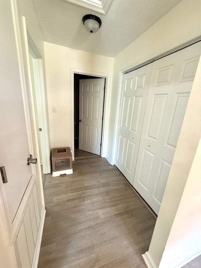 136 Jubilee Dr, Lynchburg, VA 24501 - corridor with light wood finished floors, heating unit, and a textured ceiling