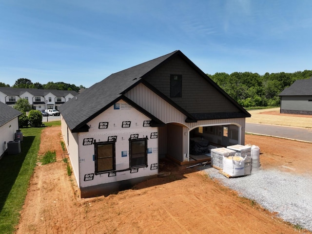 24 Stony Ridge Blvd, Forest, VA 24551 - view of front of home with central AC and gravel driveway