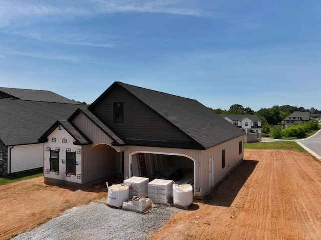 24 Stony Ridge Blvd, Forest, VA 24551 - view of front of house featuring an attached garage, driveway, and roof with shingles
