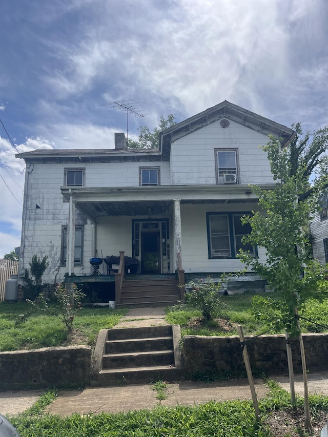1115 Jackson St, Lynchburg, VA 24504 - view of front of home with a porch and a chimney