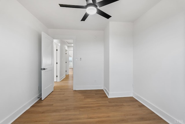 179 Meadow Brook Cir, Danville, VA 24541 - unfurnished room with a ceiling fan, light wood-style flooring, and baseboards