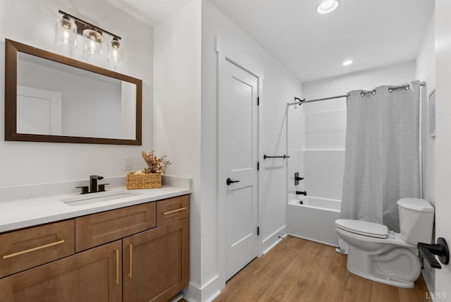 179 Meadow Brook Cir, Danville, VA 24541 - full bath featuring toilet, vanity, wood finished floors, shower / bath combination with curtain, and recessed lighting