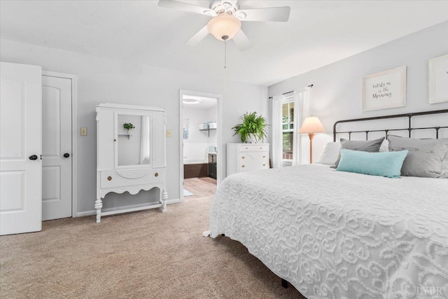 261 Carrington Ln, Roseland, VA 22967 - carpeted bedroom with ensuite bath, baseboards, and a ceiling fan