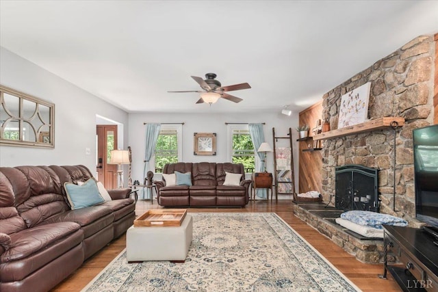 261 Carrington Ln, Roseland, VA 22967 - living area with wood finished floors, a ceiling fan, and a fireplace