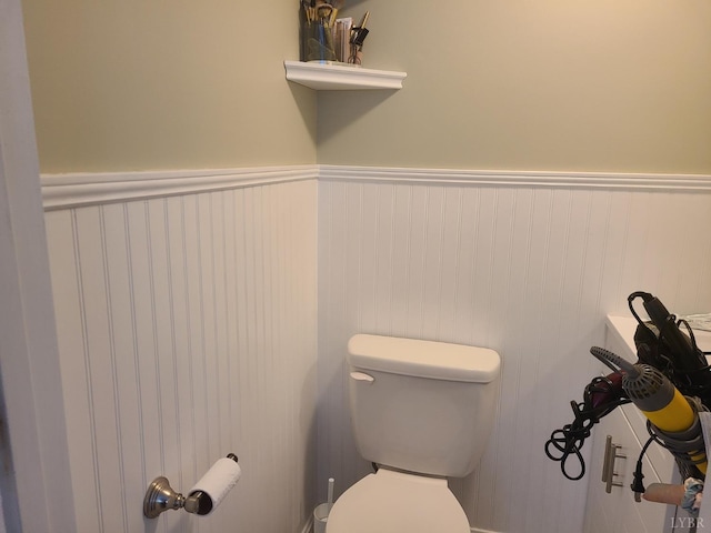 356 Ferguson St, Appomattox, VA 24522 - bathroom featuring a wainscoted wall and toilet