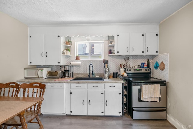 400 Blue Ridge St, Lynchburg, VA 24501 - kitchen with white appliances, a sink, open shelves, decorative backsplash, and crown molding
