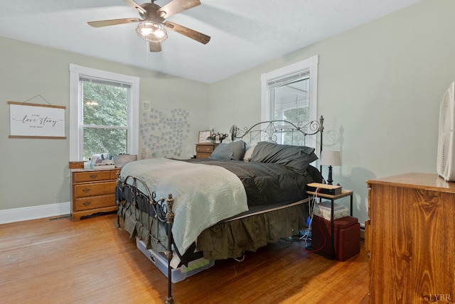 221 Castle Craig Dr, Evington, VA 24550 - bedroom with light wood-style floors, baseboards, and ceiling fan