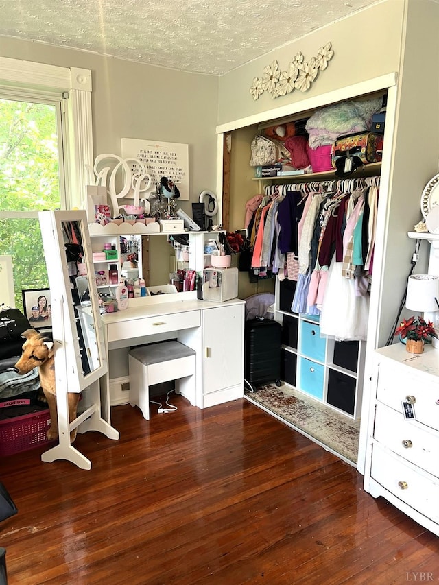221 Castle Craig Dr, Evington, VA 24550 - bedroom with a closet, wood finished floors, and a textured ceiling