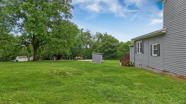 221 Castle Craig Dr, Evington, VA 24550 - view of green lawn featuring view of wooded area