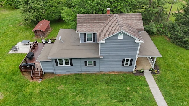 221 Castle Craig Dr, Evington, VA 24550 - back of house featuring a wooden deck, a chimney, and a lawn