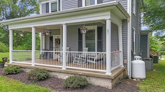 221 Castle Craig Dr, Evington, VA 24550 - view of exterior entry with a porch and central AC