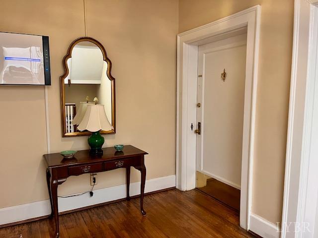 2910 Rivermont Ave Unit 301, Lynchburg, VA 24503 - hallway with dark wood-style floors and baseboards