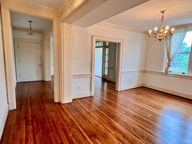 2910 Rivermont Ave Unit 301, Lynchburg, VA 24503 - spare room with a chandelier, ornamental molding, wood finished floors, and baseboards